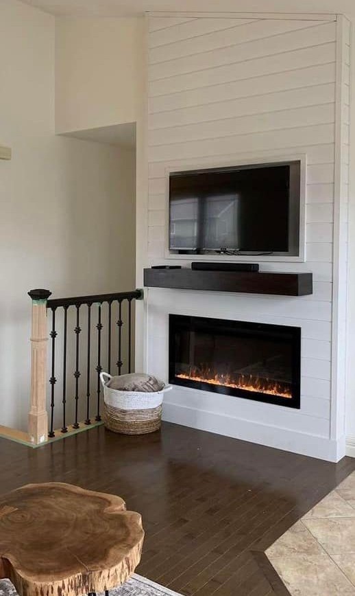 Shiplap feature wall with fireplace — Geldart's Contracting